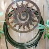 Rustic Sun Wall-Mount Garden Hose Hanger 2 Rustic Sun Wall-Mount Garden Hose Hanger -Outdoor Garden Care Shop 8611025 9611 tif