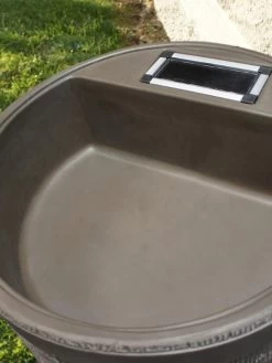 Round Rain Barrel With Planter, 35 Gallons -Outdoor Garden Care Shop 8612856WALNT 02V tif